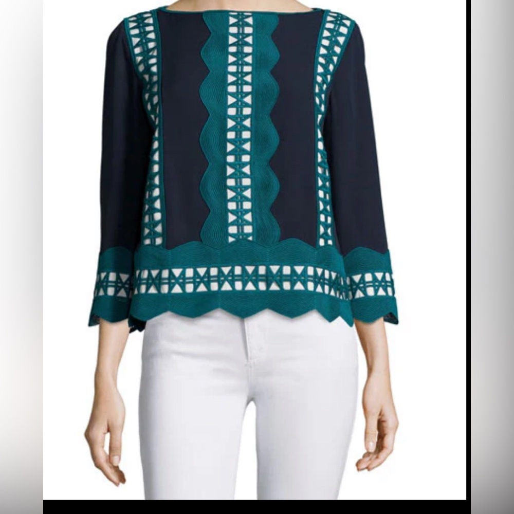 Tory Burch Size 4 top 
Approximately Armpit to armpit- 18.5”
collar to hem -21”